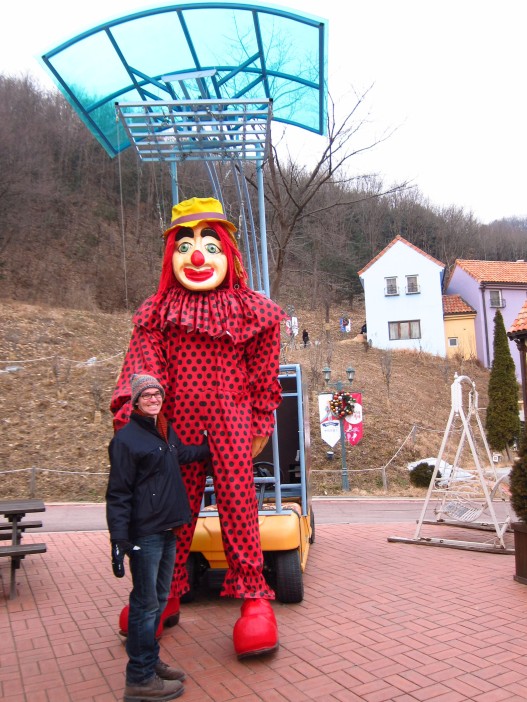Ben enjoying a cheeky squeeze with a larger than life sized clown.